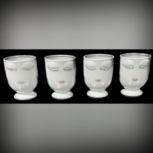 Set of 4 make up accessory dishes.